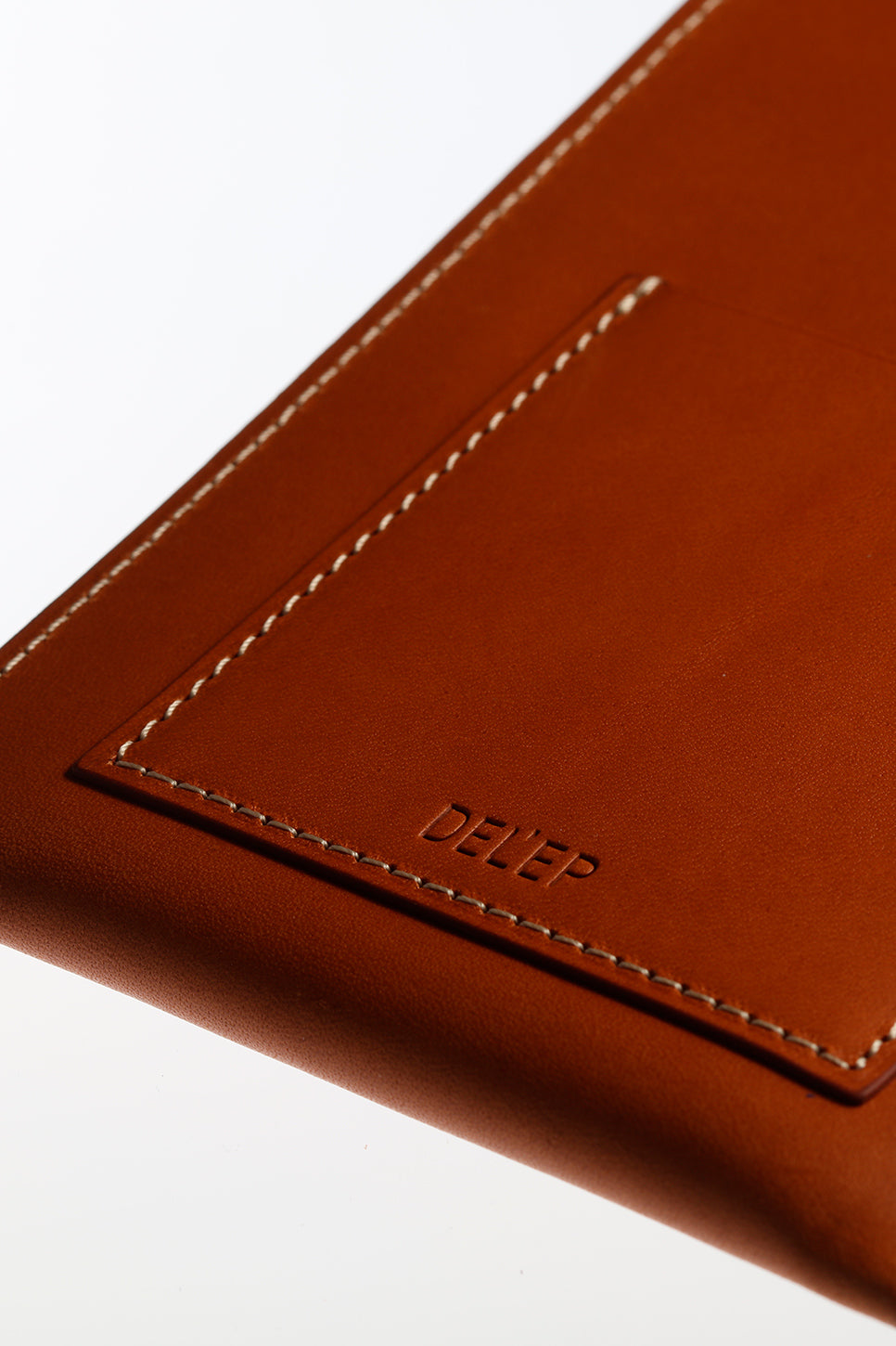 tan leather phone pouch