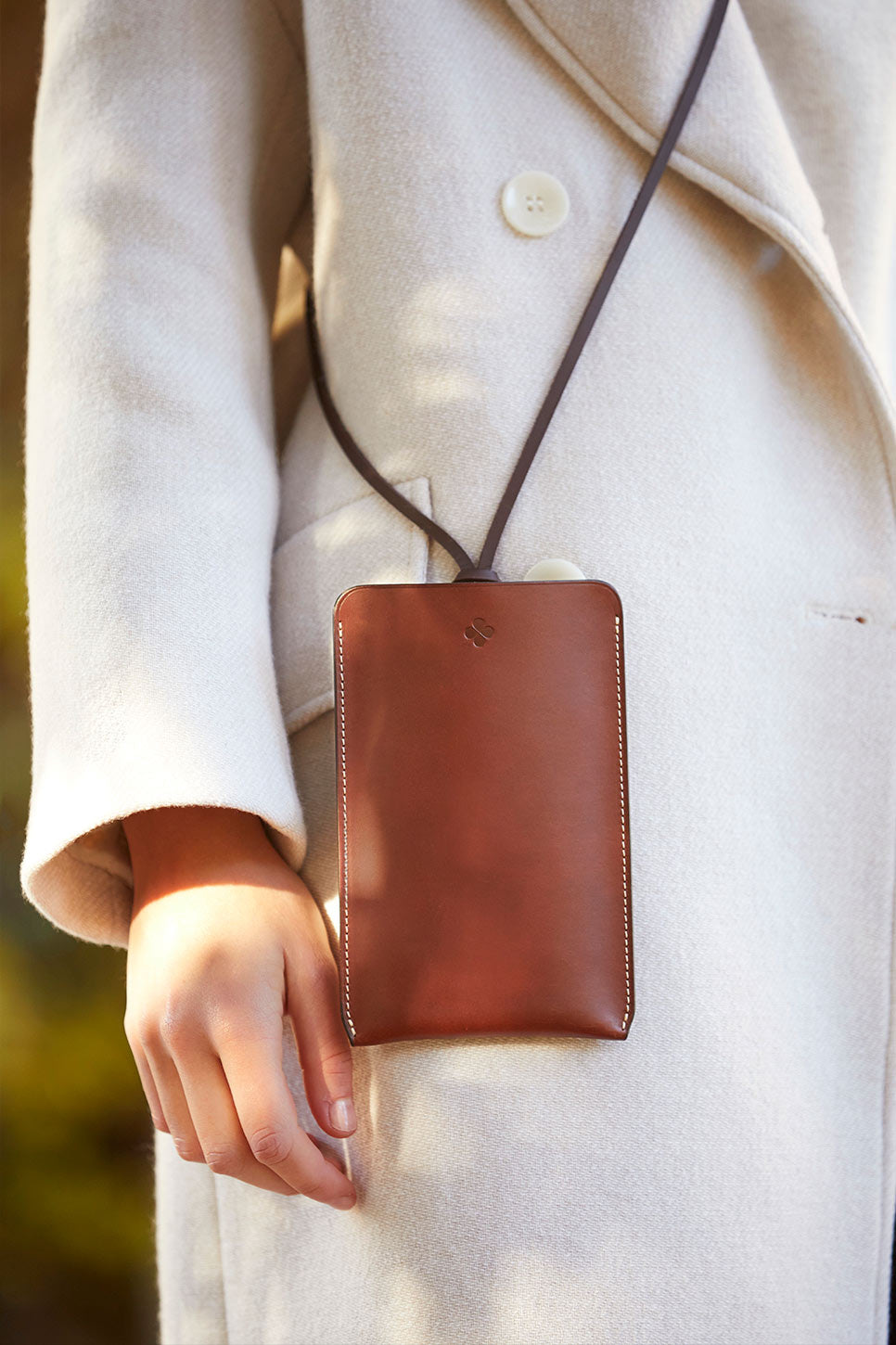 luxury handcrafted brown leather phone pouch
