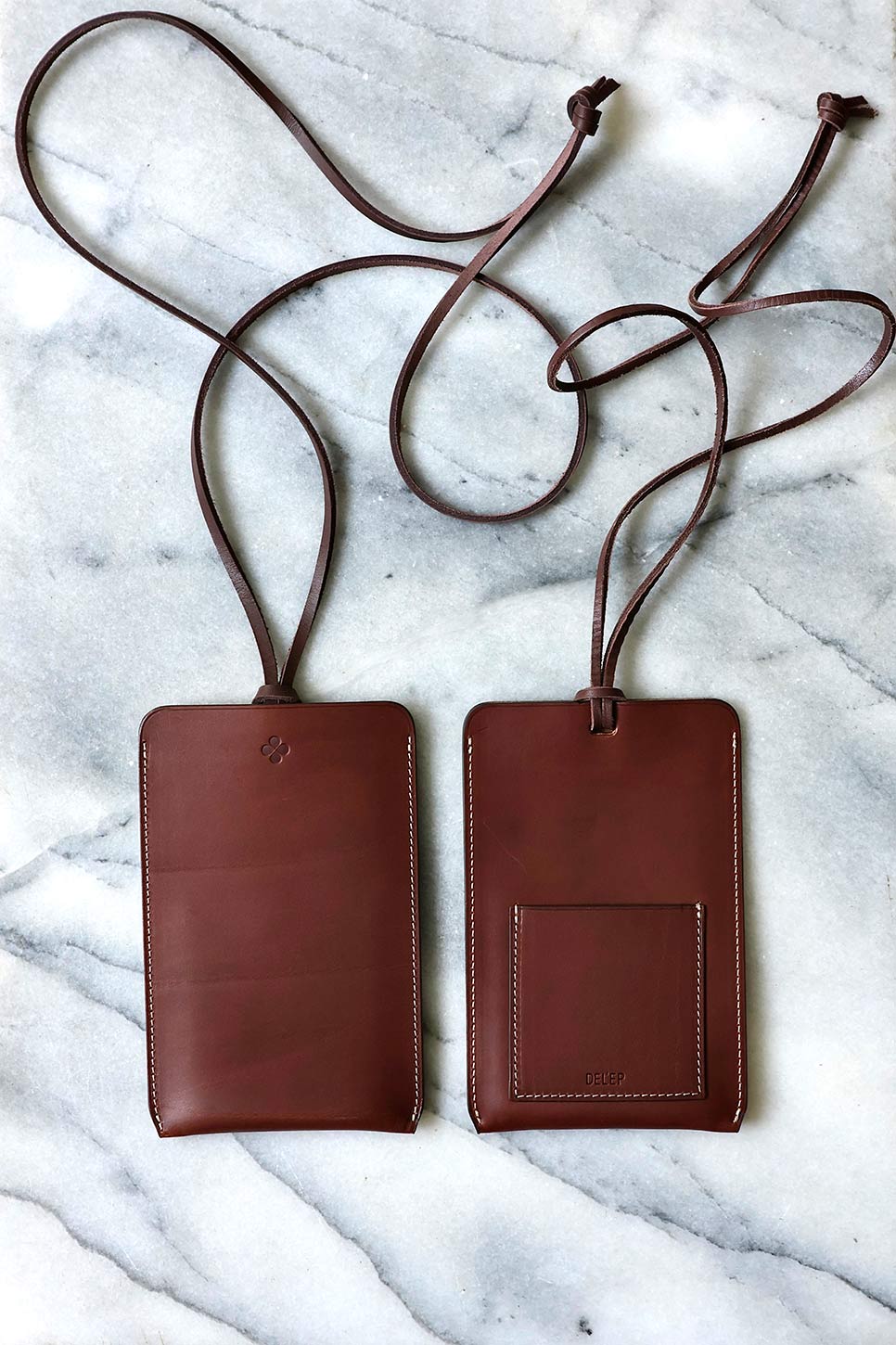 luxurious handcrafted brown leather phone pouch